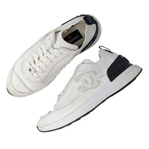 Chanel 2021 CC Logo Knit Sneakers Slip On White Black Athletic 39.5 | 9 | 8.5